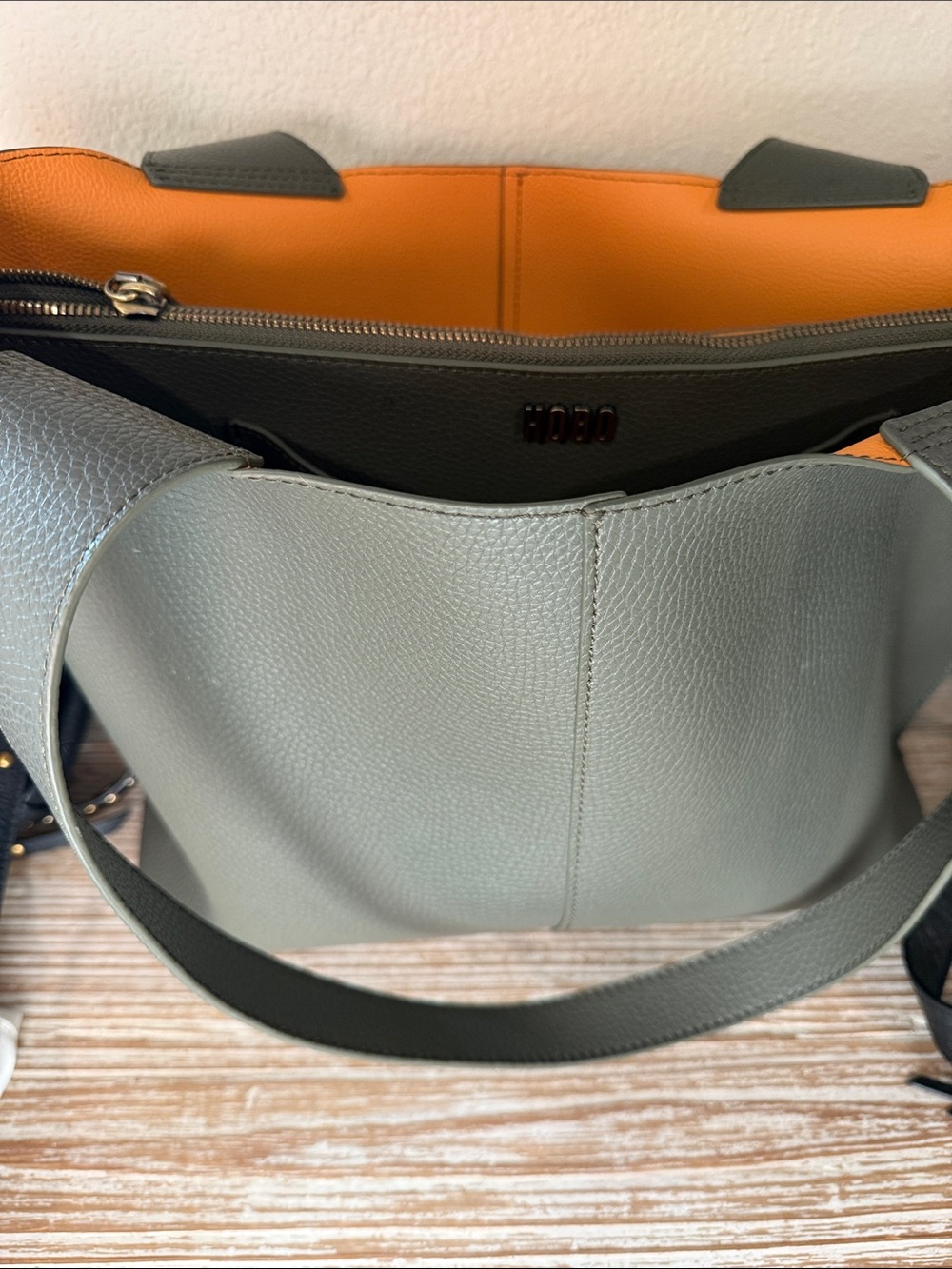 HOBO Pebbled Leather Tote in Sage with Orange Lining